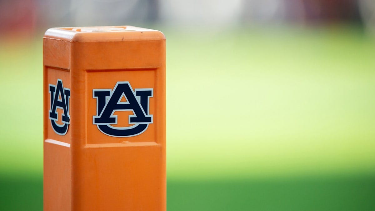 Auburn cheeleader knocks down Oklahoma player running onto field while performing stunts Internet InfoMedia auburn cheeleader knocks down oklahoma player running onto field while performing stunts