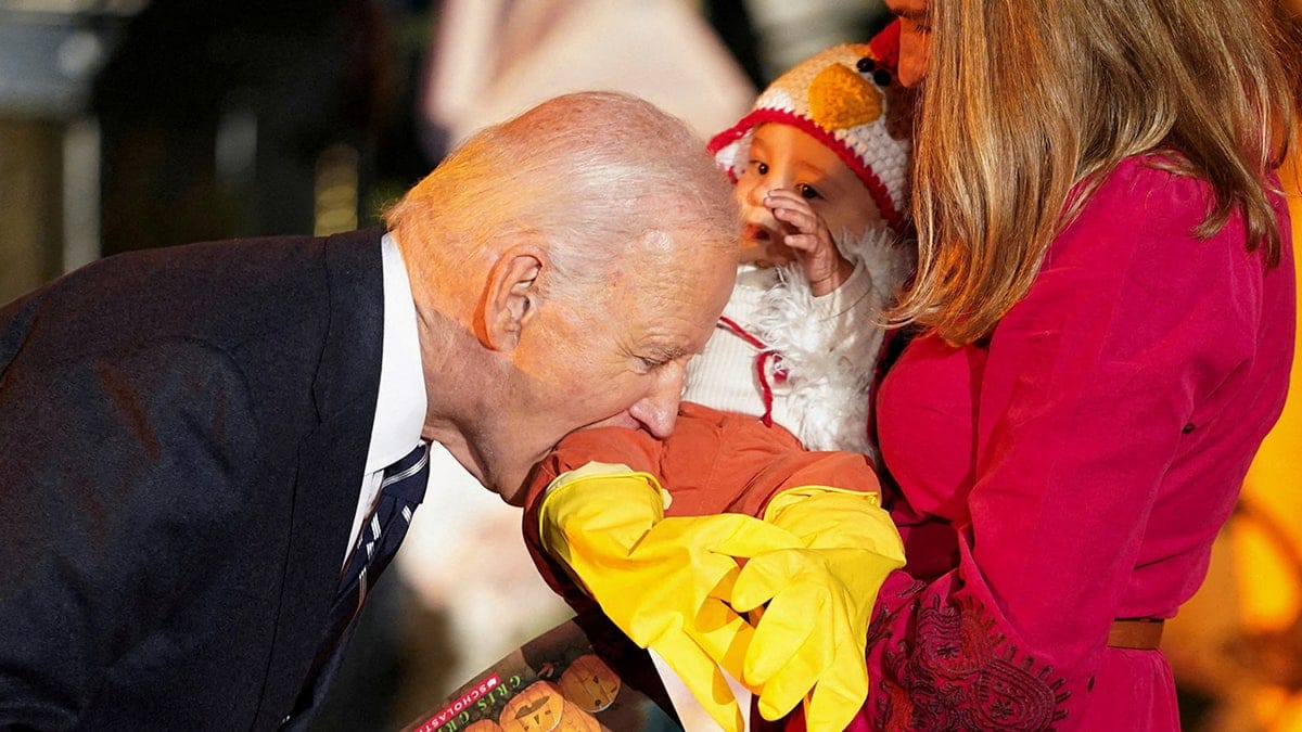 Internet InfoMedia biden bites babies visiting for white house halloween trick or treat celebration