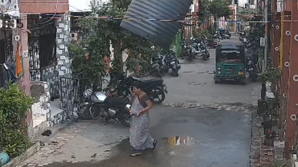 Internet InfoMedia video captures water tank falling on woman but she miraculously escapes injury