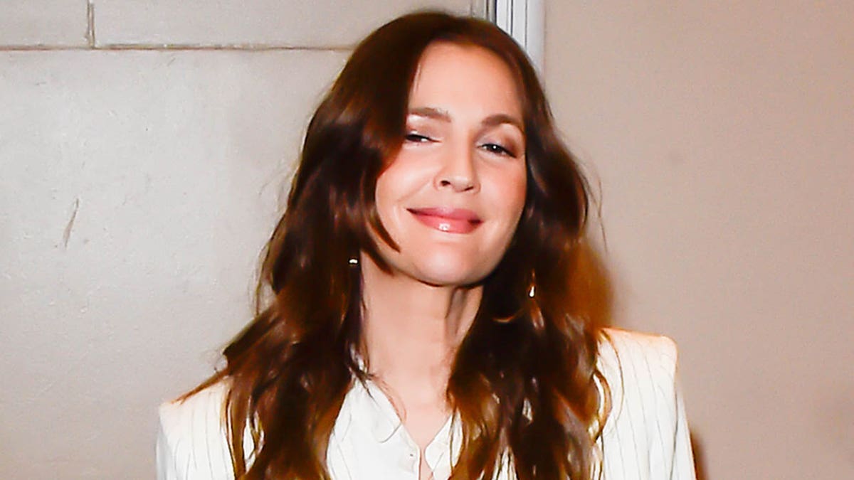 Drew Barrymore admits people 'have to warn' her to 'back off' from touching during interviews Internet InfoMedia drew barrymore admits people have to warn her to back off from touching during interviews