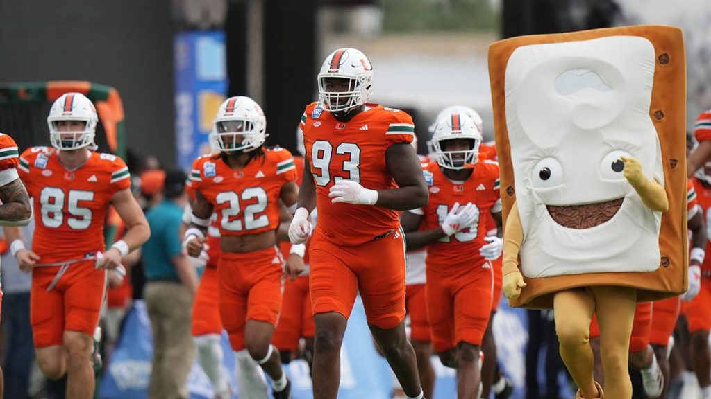 Internet InfoMedia miami teammates fight on sideline during pop tarts bowl