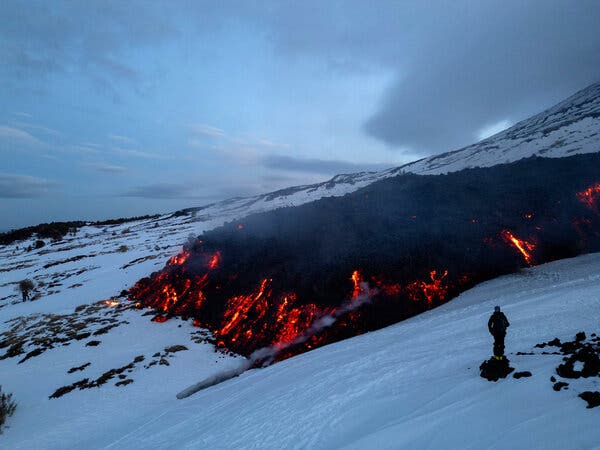 Internet InfoMedia as tourists swarm erupting mount etna italian authorities warn them away
