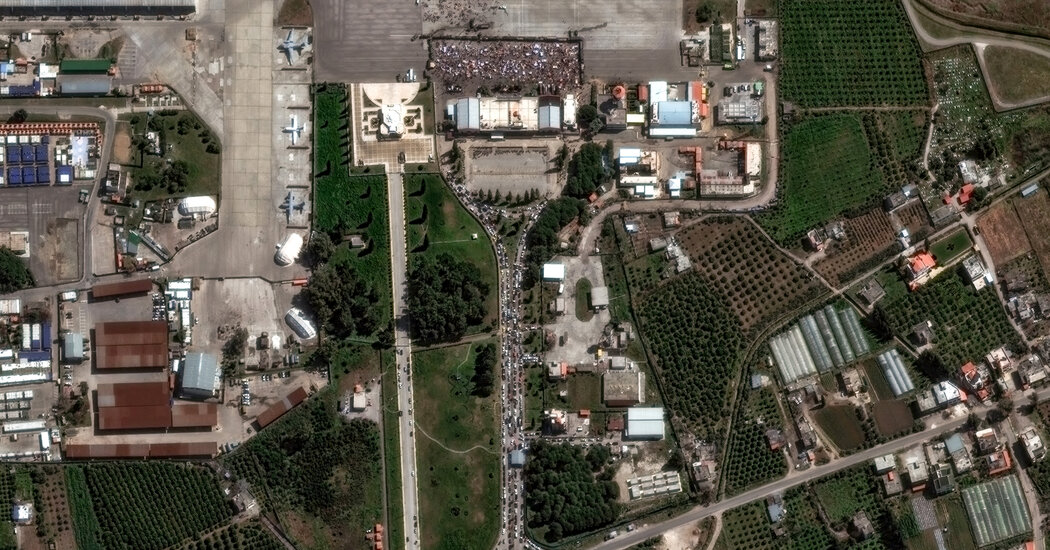 Hundreds of Civilians in Syria Take Shelter at Russian Air Base Internet InfoMedia hundreds of civilians in syria take shelter at russian air base