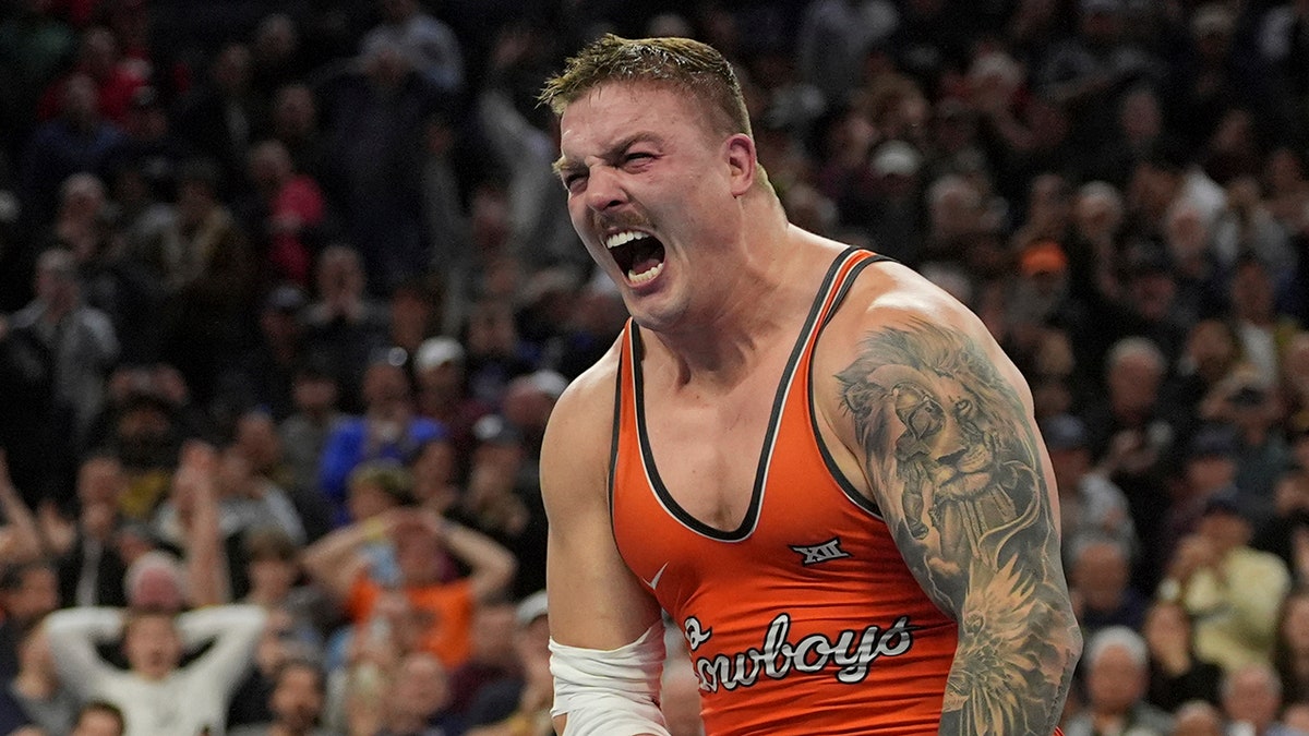 Internet InfoMedia oklahoma states wyatt hendrickson fires off faithful message after shocking ncaa title win in front of trump