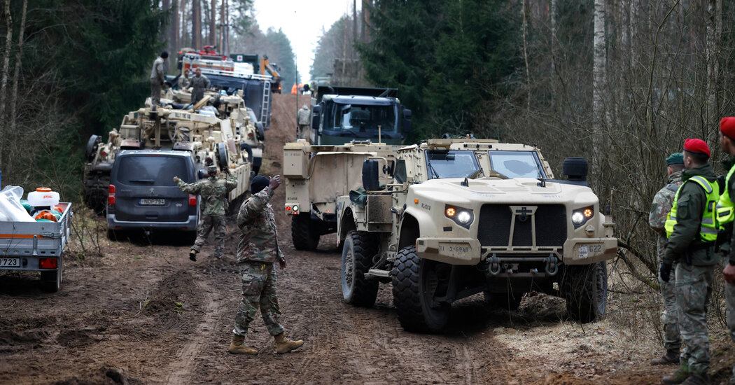Internet InfoMedia search for missing us soldiers in lithuania continues as crews work to extract vehicle
