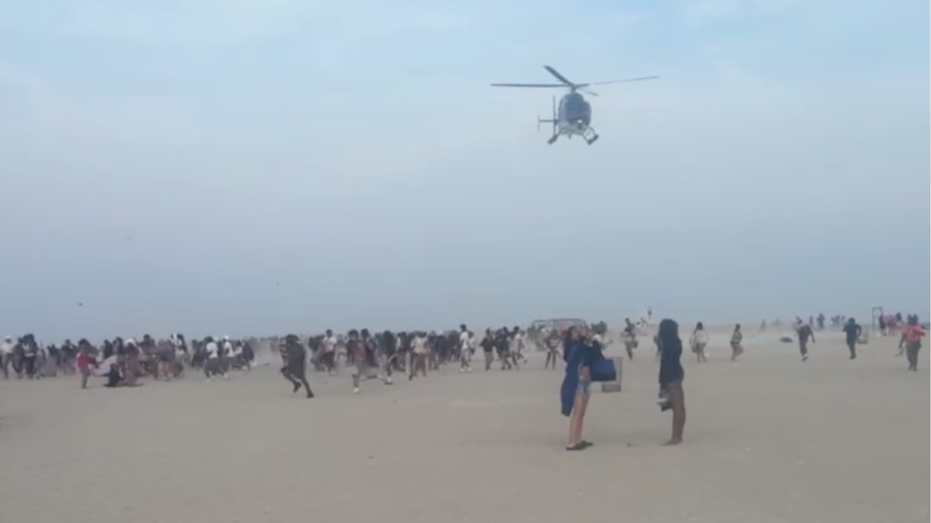 Internet InfoMedia hundreds of teenagers transform peaceful beach into chaos as police forced to break up fights