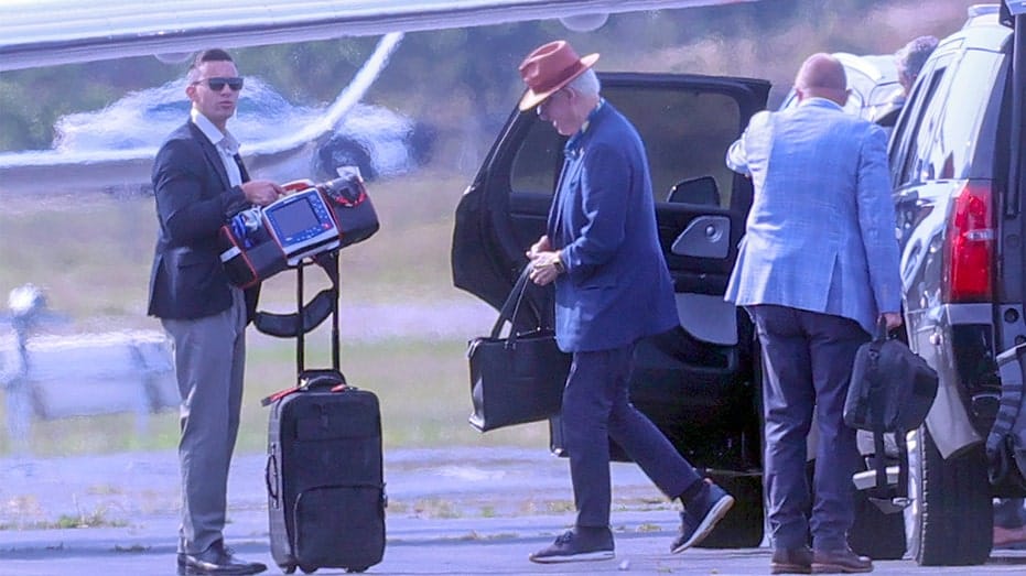 Internet InfoMedia bill clinton seen leaving airport with defibrillator sparking health fears