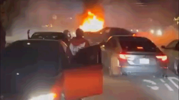 Internet InfoMedia arrest made after explosive street takeover video shows mob ambushing couple during fiery car meetup
